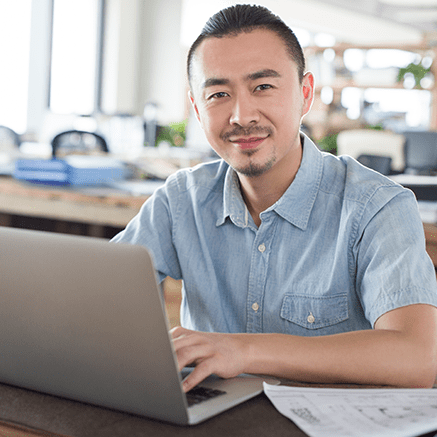 Available Plans: man on laptop
