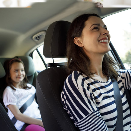 Automatic Payments woman riding in car with daughter