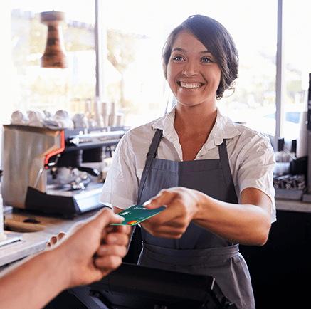 Card Features cashier taking credit card