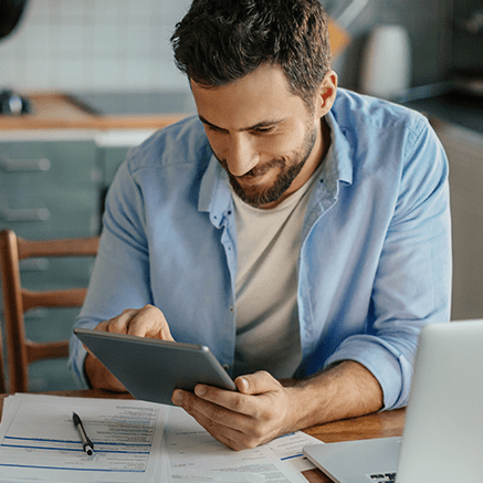 Home Equity Credit Line male looking at tablet
