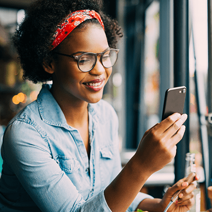 Contactless Convenience woman looking at mobile phone