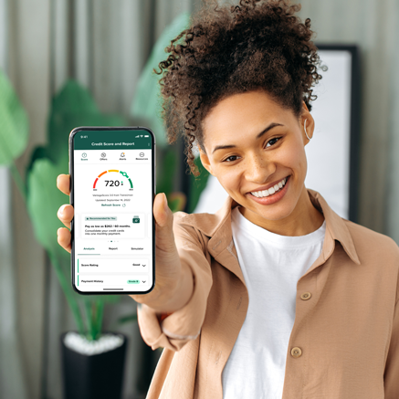 Why Enroll in Credit Score Woman with phone showing credit score screen